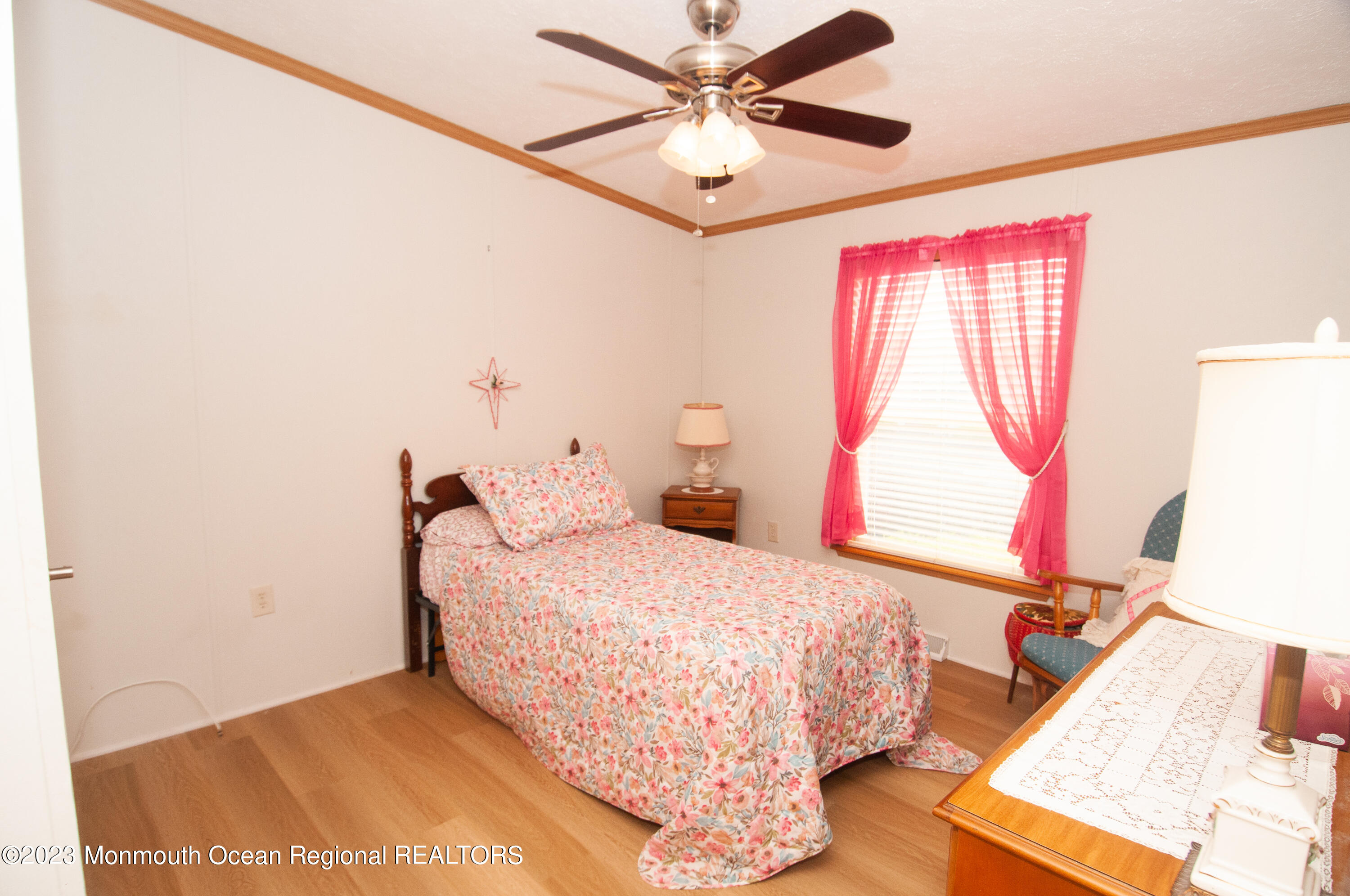 116 Woody Road Freehold, NJ 07728 - Photo 23 of 33 a bedroom with a bed and a window