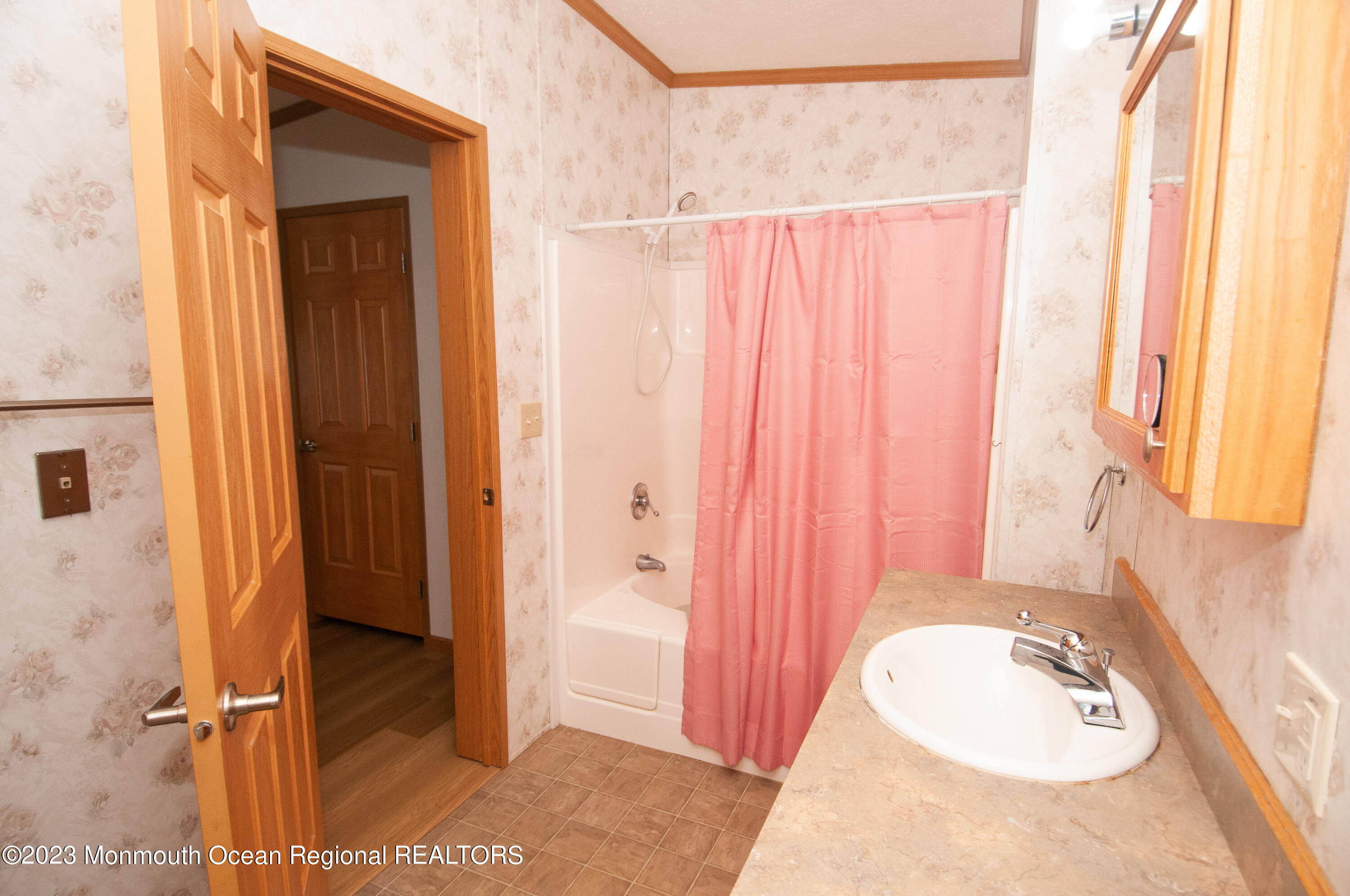 116 Woody Road Freehold, NJ 07728 - Photo 29 of 33 a bathroom with a tub and shower
