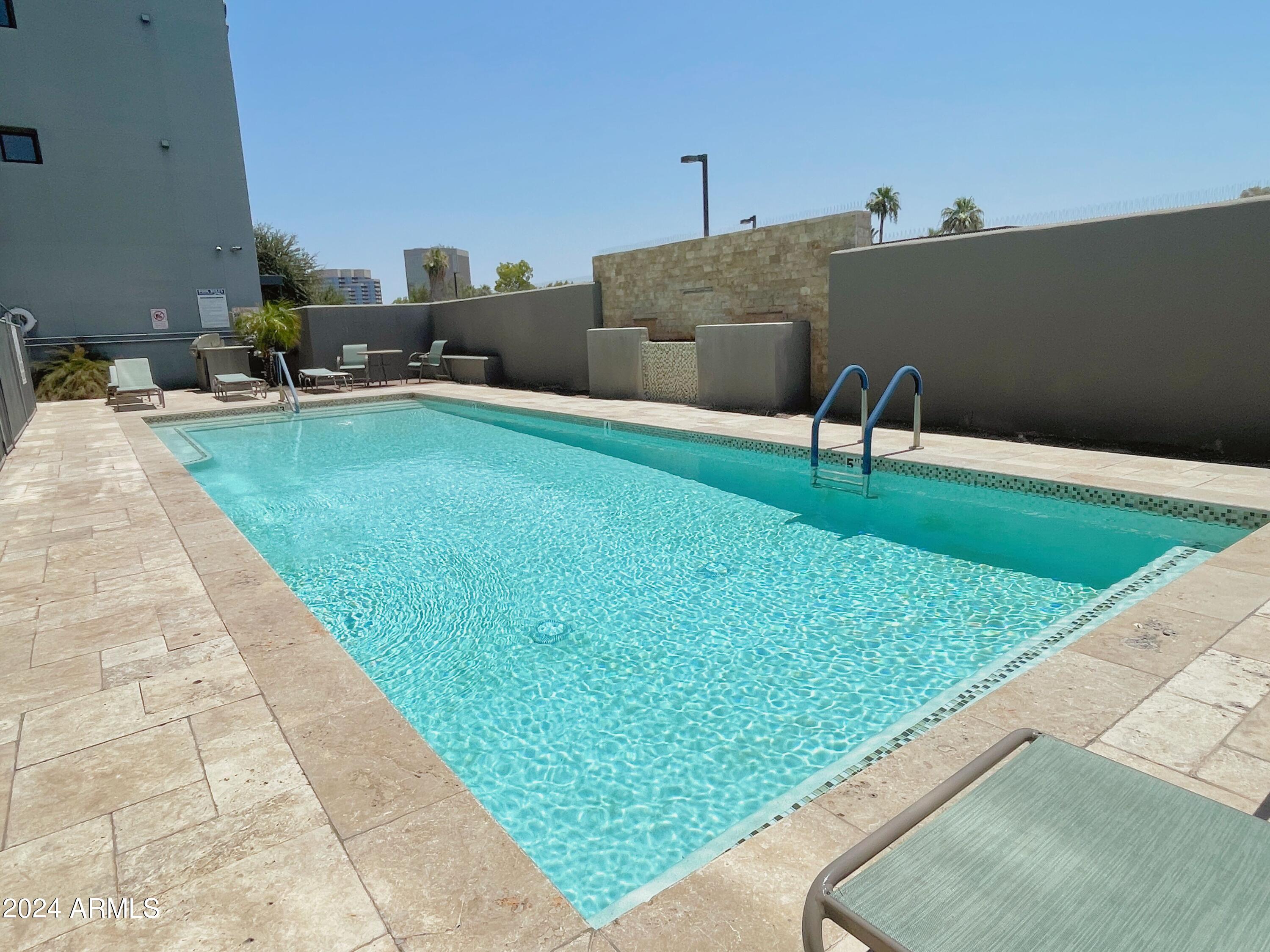 535 West Thomas Road, Unit 401 Phoenix, AZ 85013 - Photo 22 of 22 a view of a backyard with sitting area