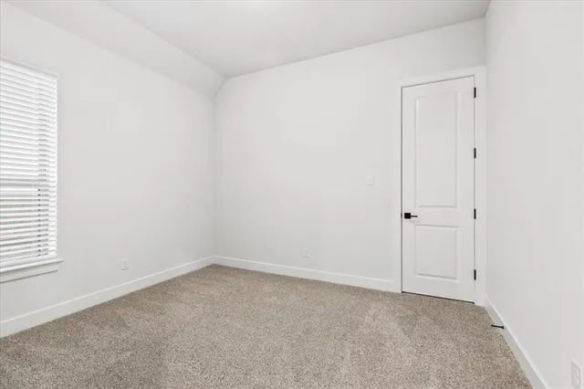 a room with a sink cabinets and utility