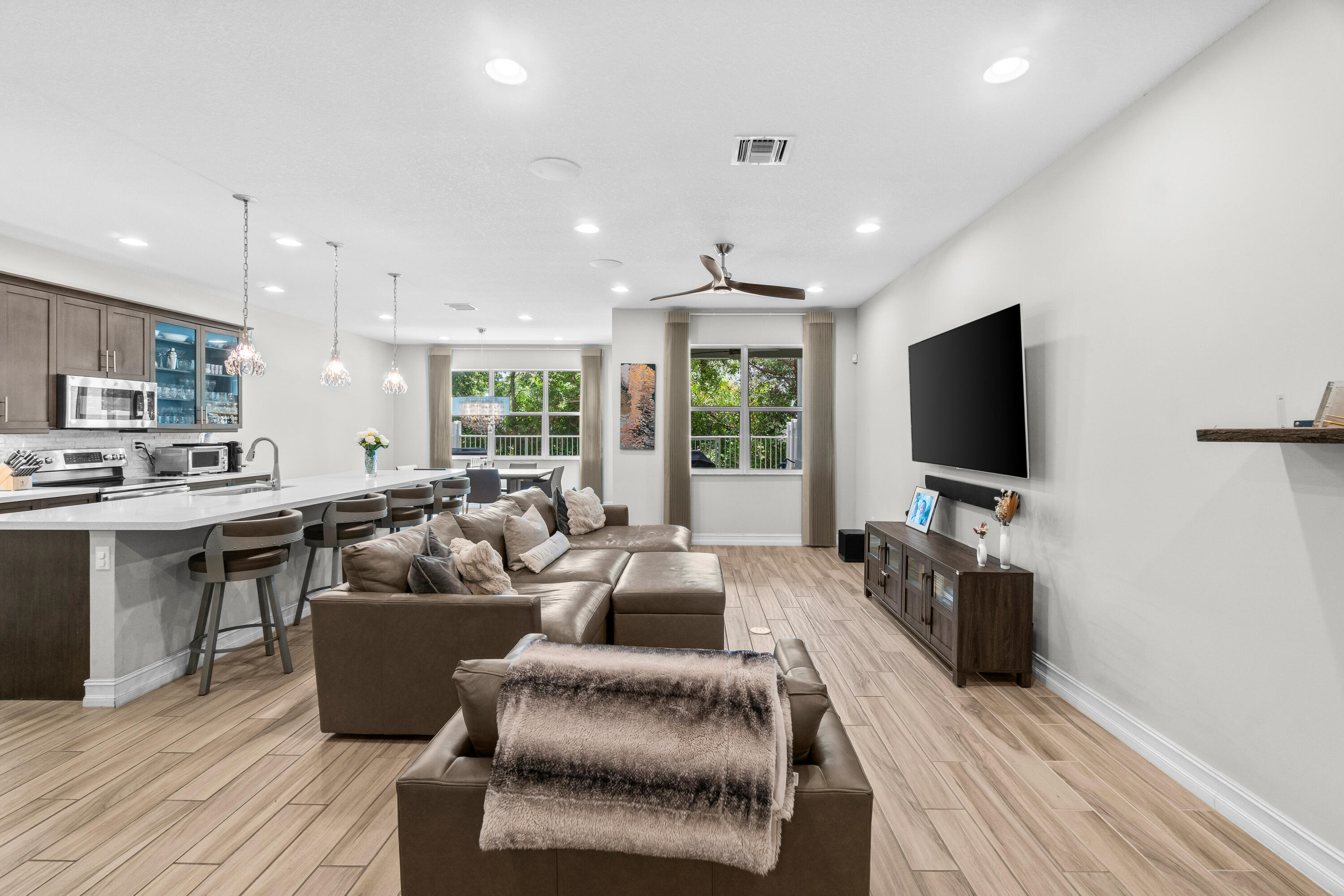 100 Northwest 69th Circle, Unit 102 Boca Raton, FL 33487 - Photo 7 of 33 Living room/Kitchen