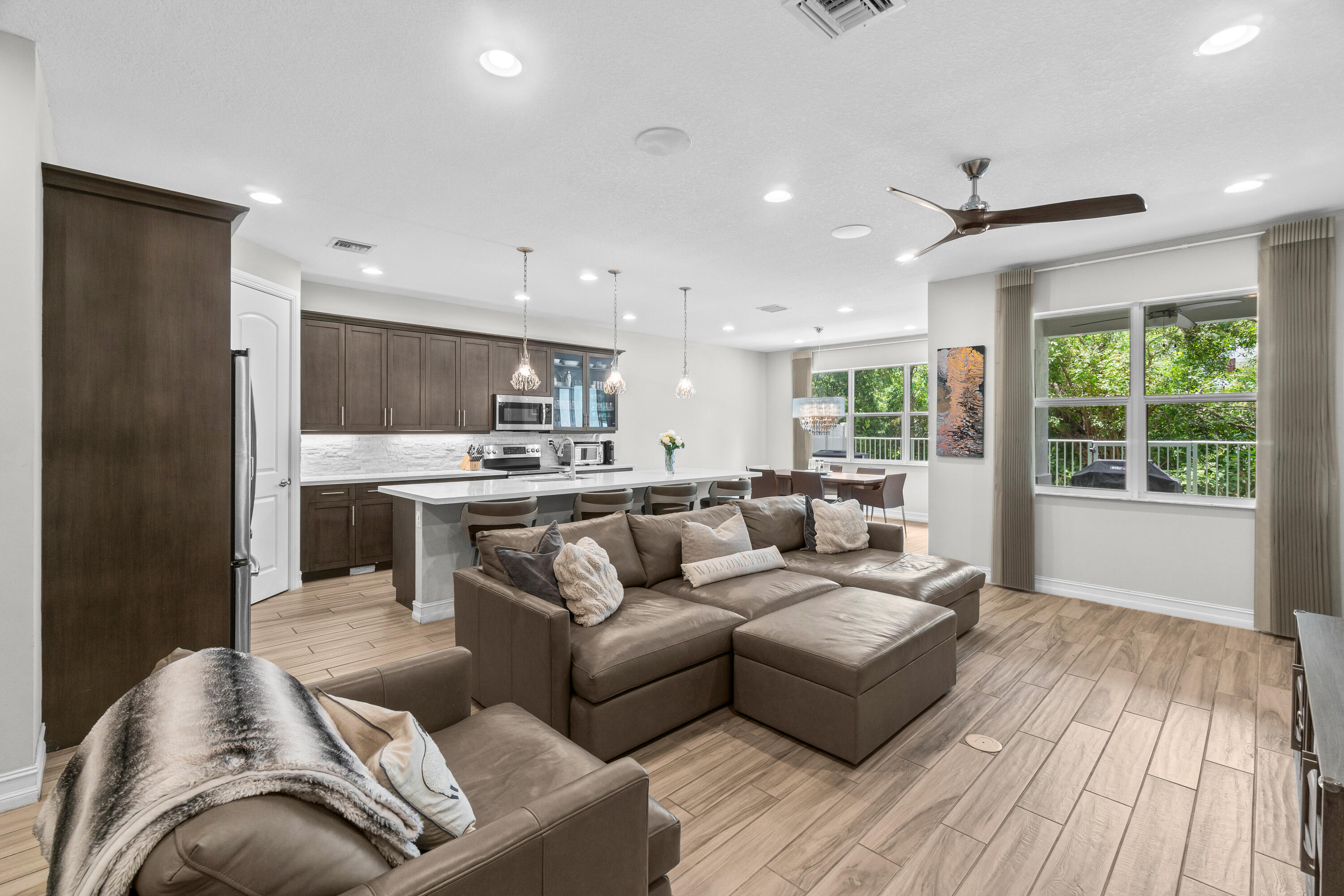 100 Northwest 69th Circle, Unit 102 Boca Raton, FL 33487 - Photo 8 of 33 Living room/Kitchen