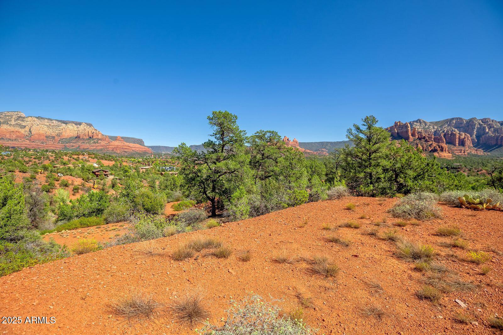 463 Brewer Road Sedona, AZ 86336 - Photo 13 of 22 a view of a road with a mountain in the background