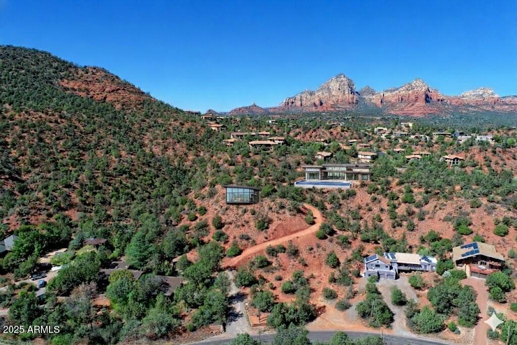 463 Brewer Road Sedona, AZ 86336 - Photo 2 of 22 an aerial view of residential houses with outdoor space and trees
