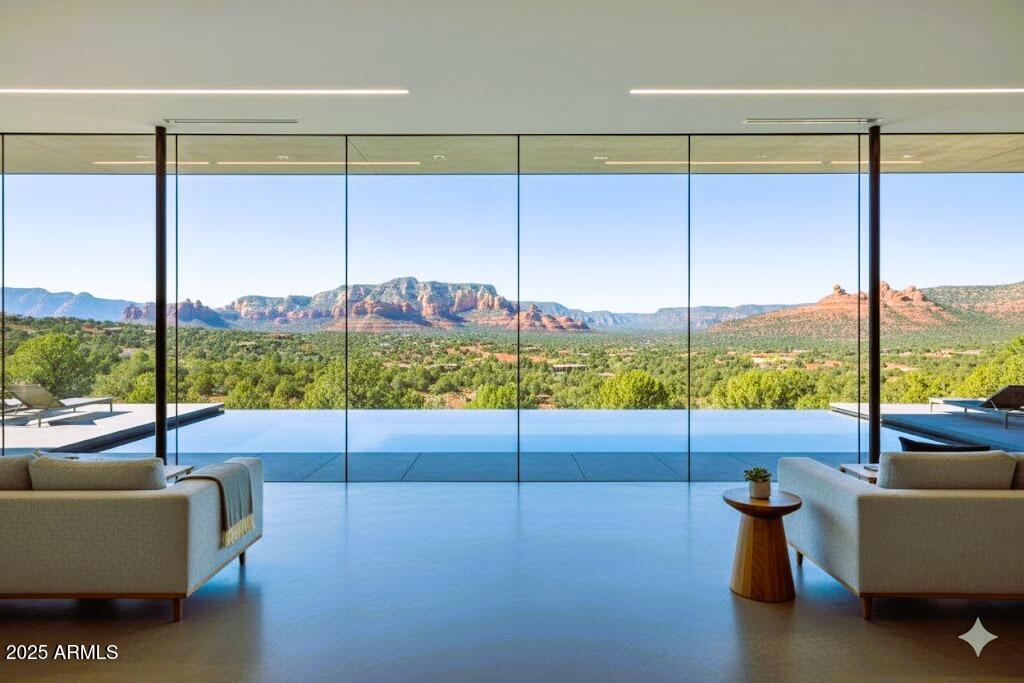 463 Brewer Road Sedona, AZ 86336 - Photo 8 of 22 a view of an empty room with glass windows