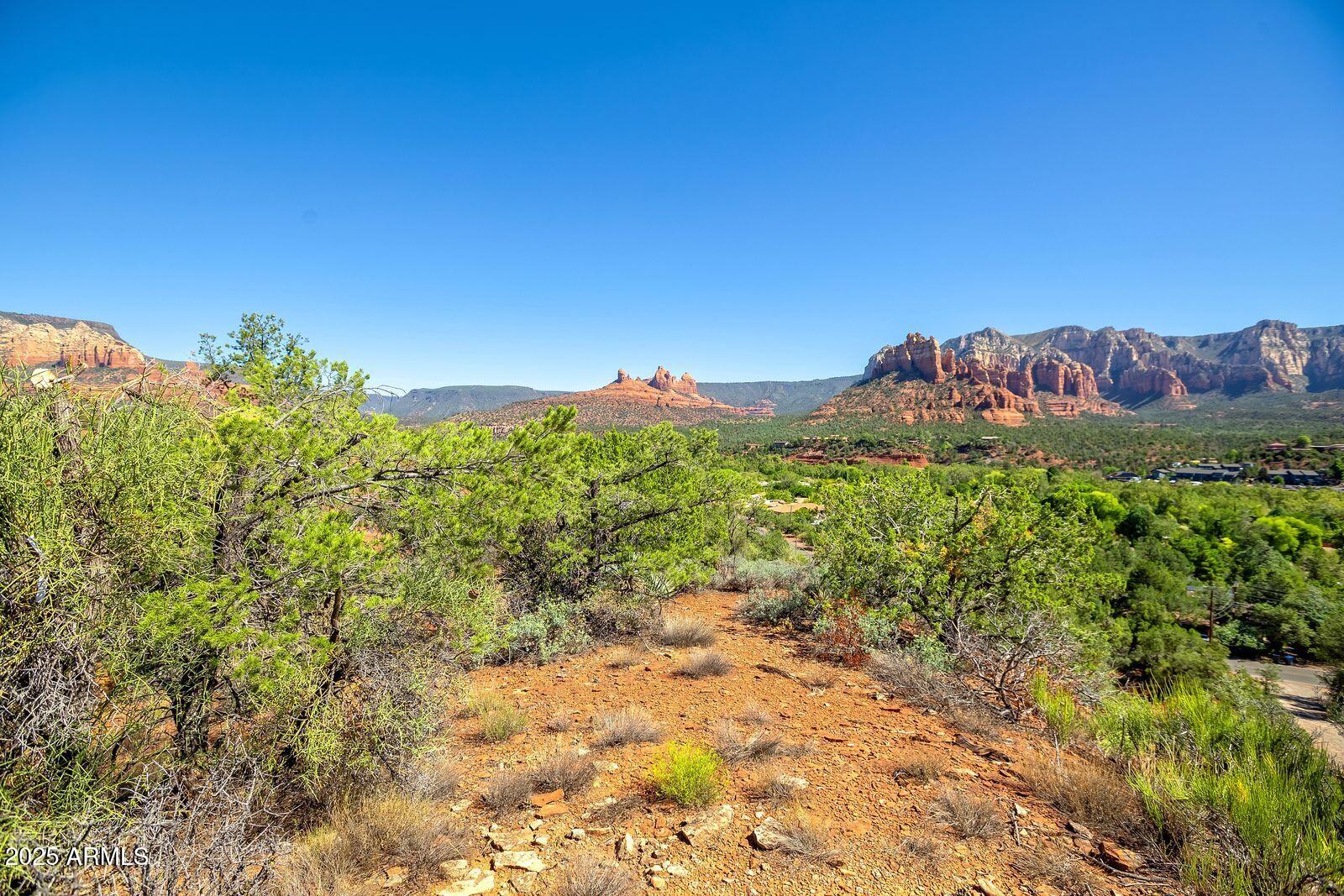 463 Brewer Road Sedona, AZ 86336 - Photo 10 of 22 a view of a bunch of trees and bushes
