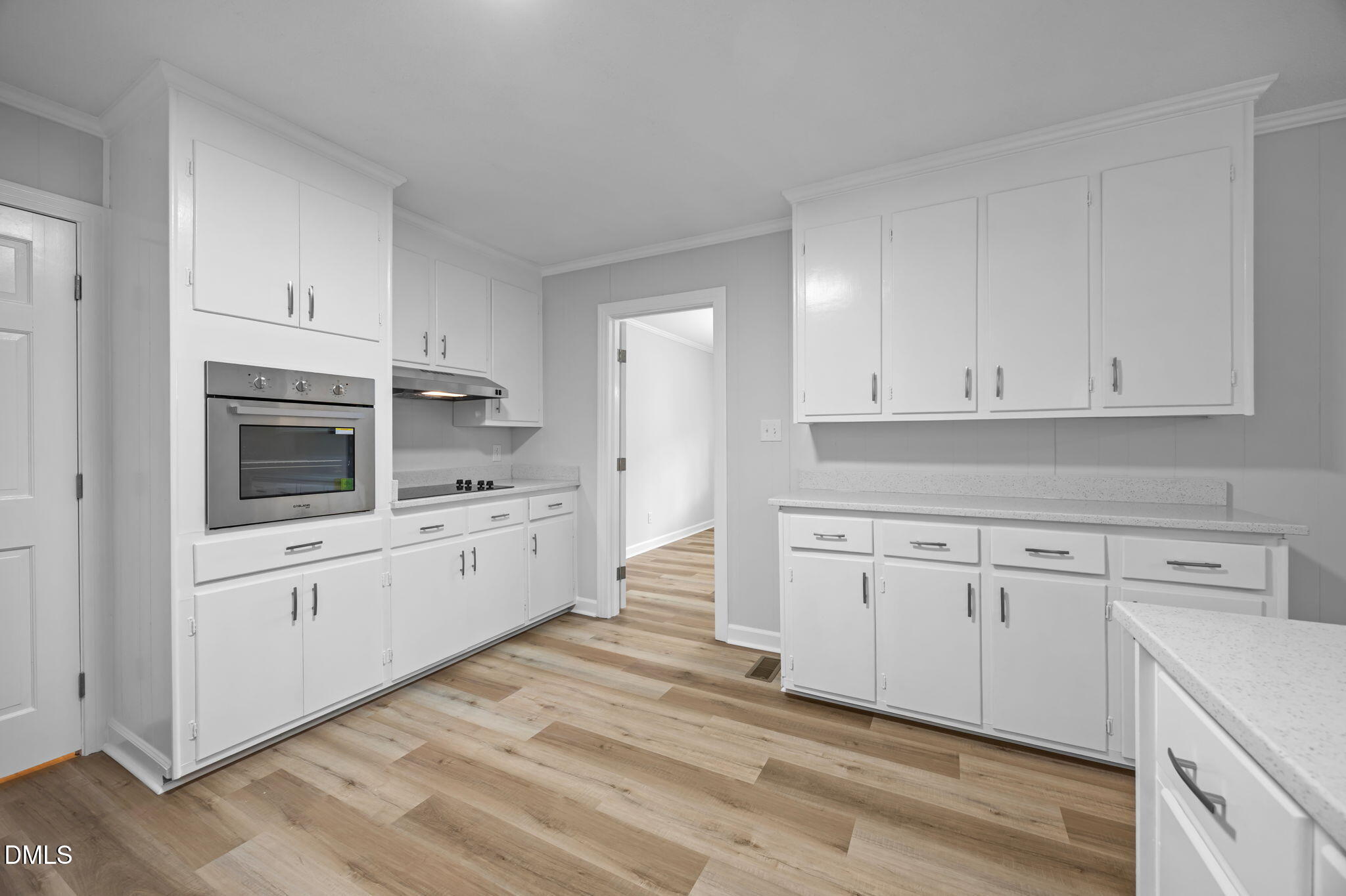 1341 Bear Trap Road Williamston, NC 27892 - Photo 13 of 42 a kitchen with granite countertop white cabinets white stainless steel appliances with sink and dishwasher