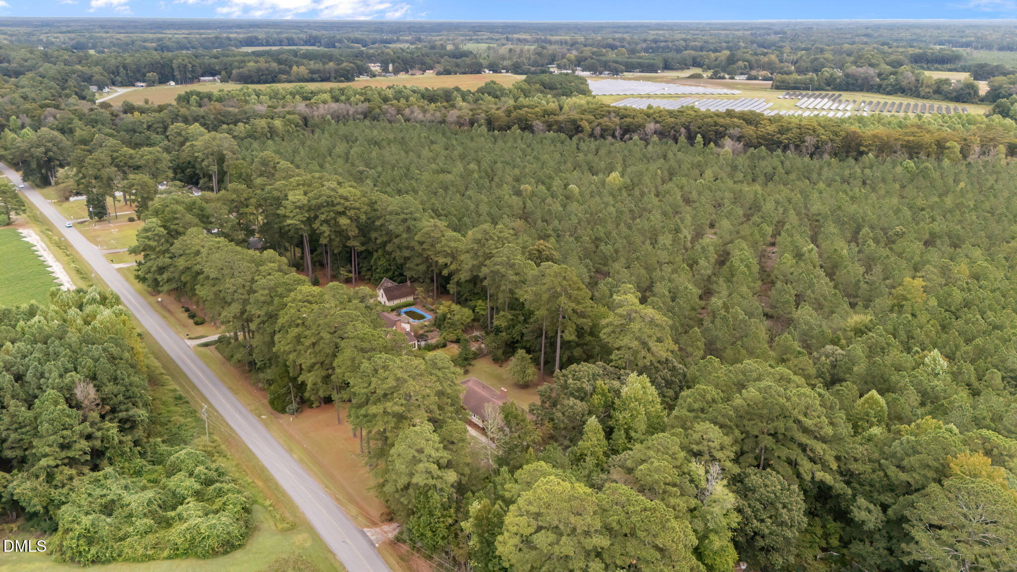 1341 Bear Trap Road Williamston, NC 27892 - Photo 31 of 42 an aerial view of residential houses with outdoor space and trees