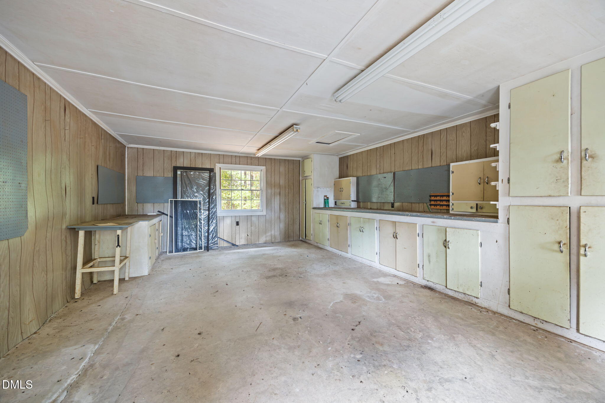 1341 Bear Trap Road Williamston, NC 27892 - Photo 32 of 42 a view of a kitchen with a sink and cabinets