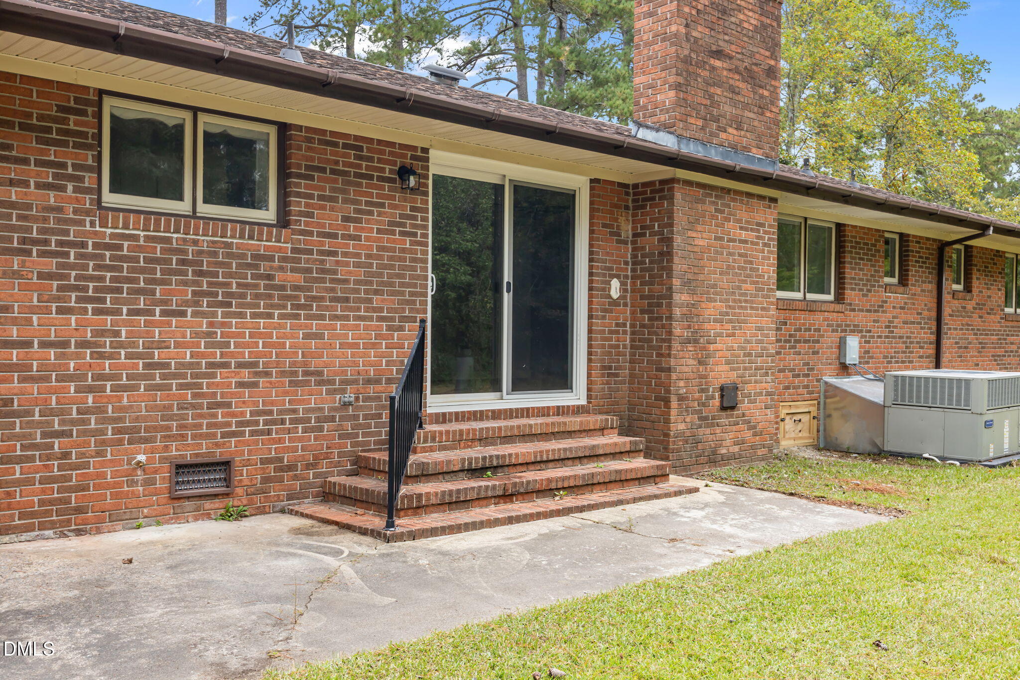 1341 Bear Trap Road Williamston, NC 27892 - Photo 36 of 42 a brick house with a yard