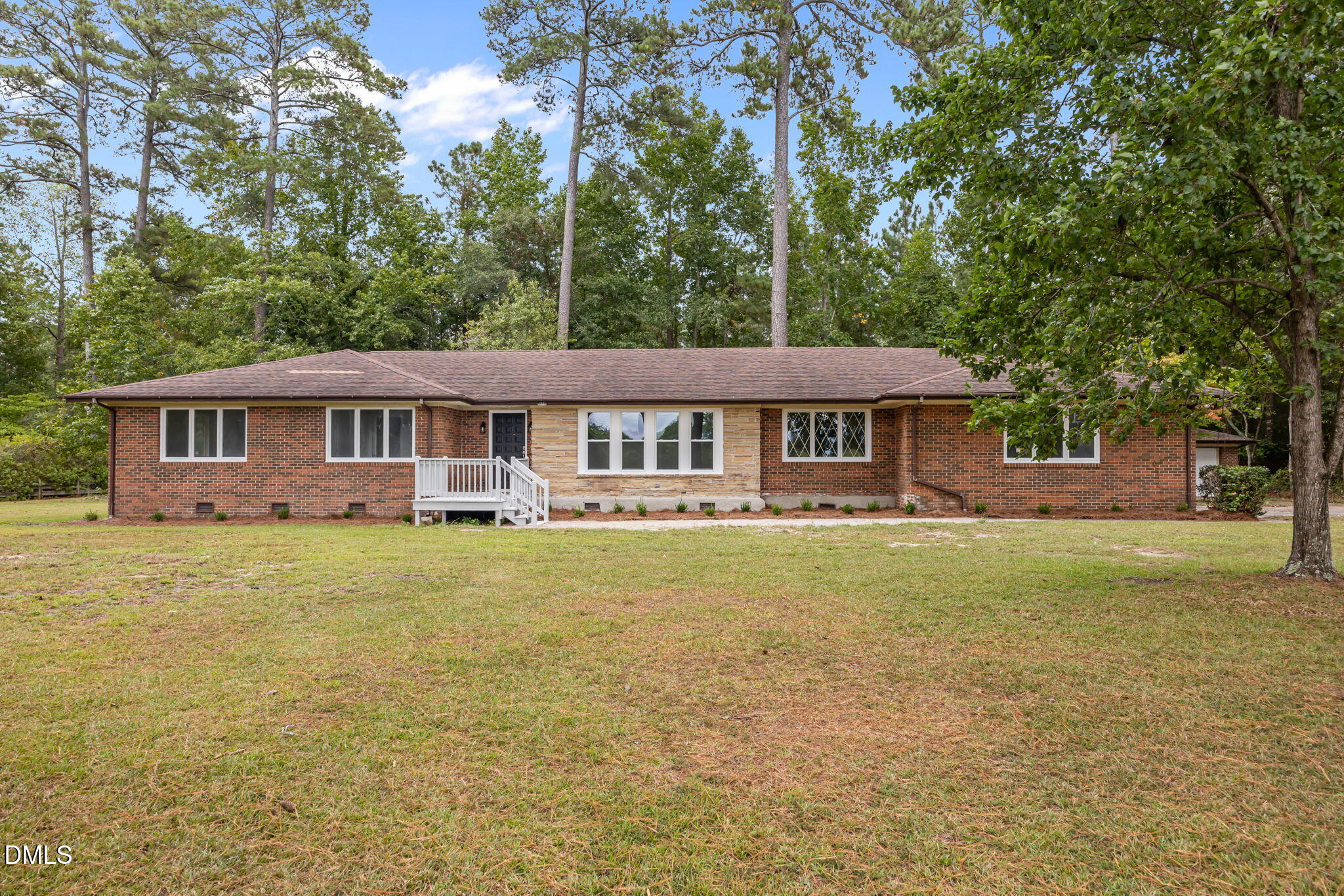 1341 Bear Trap Road Williamston, NC 27892 - Photo 38 of 42 a front view of a house with a garden
