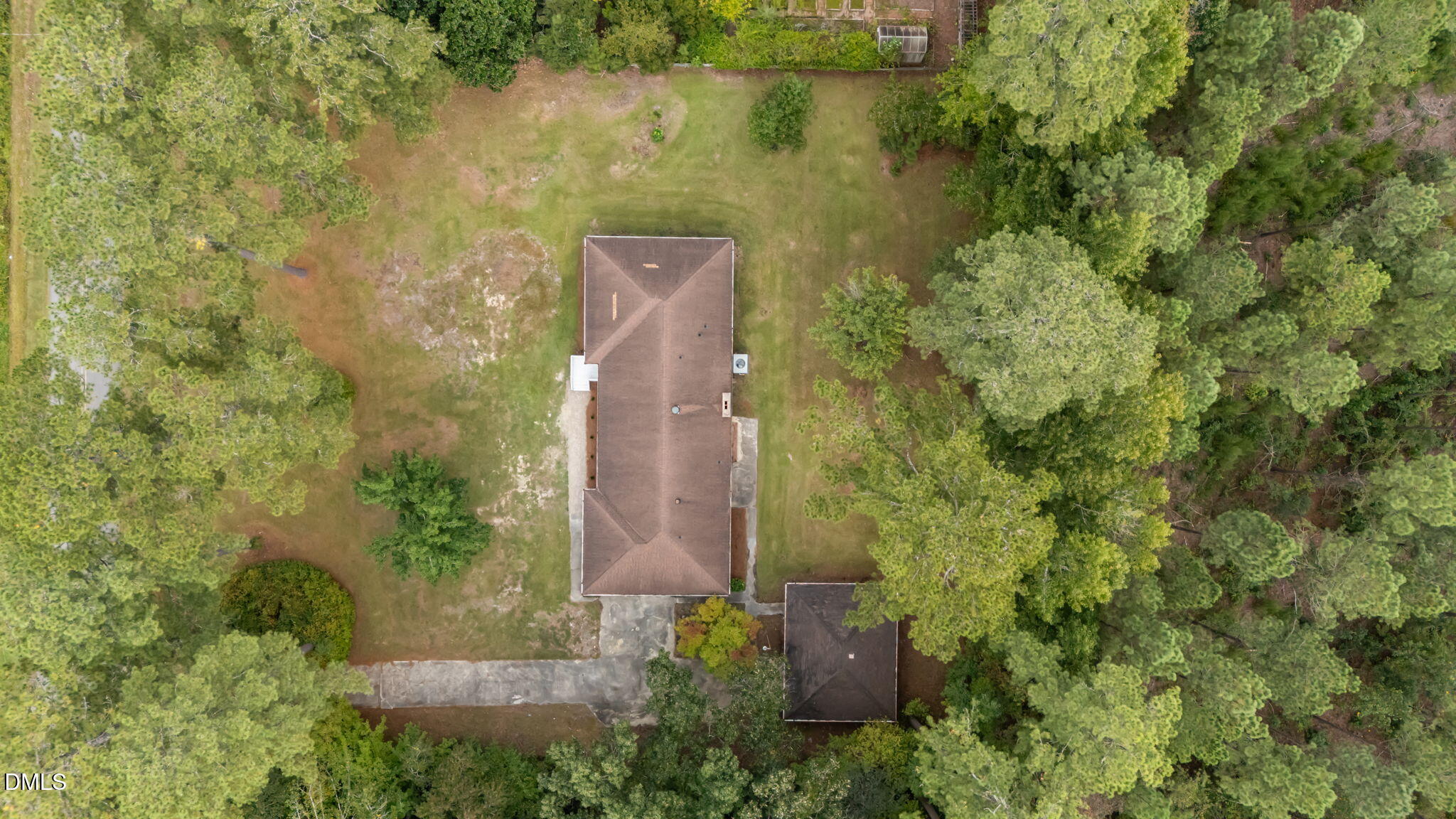1341 Bear Trap Road Williamston, NC 27892 - Photo 41 of 42 a view of a lake with a building in the background