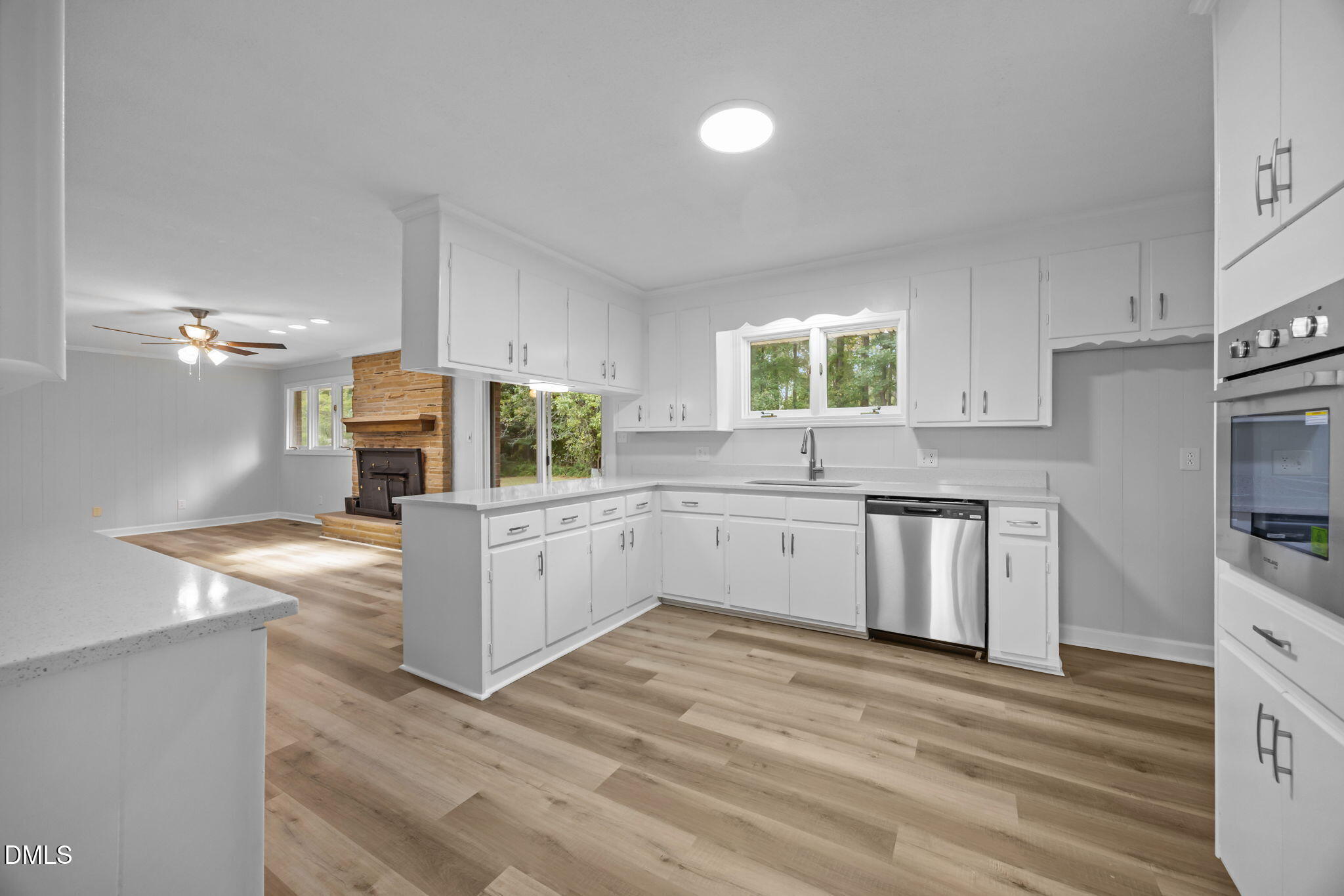 1341 Bear Trap Road Williamston, NC 27892 - Photo 8 of 42 a kitchen with a white cabinets and window