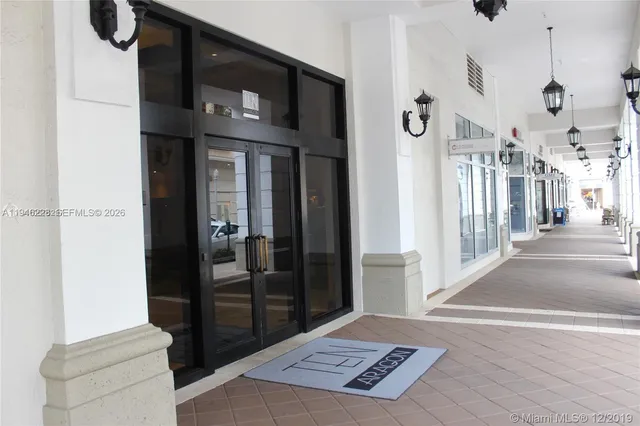 a view of a livingroom with furniture and a chandelier