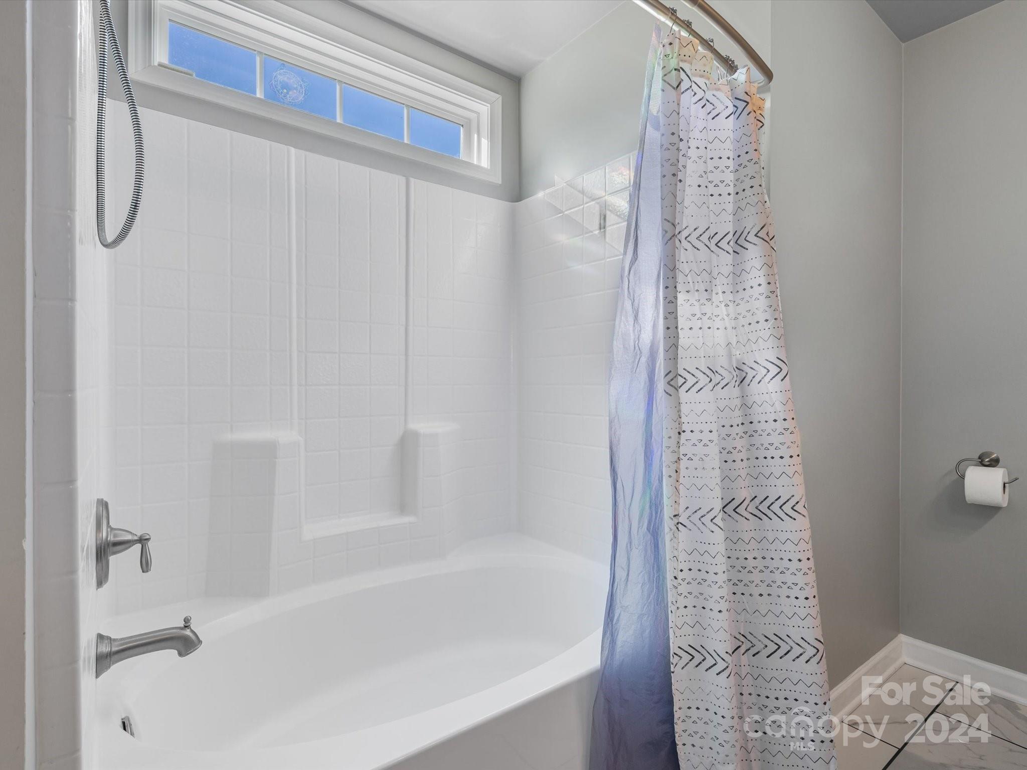 1128 State Rd S-46-817 York, SC 29745 - Photo 13 of 22 a bathroom with a shower curtain