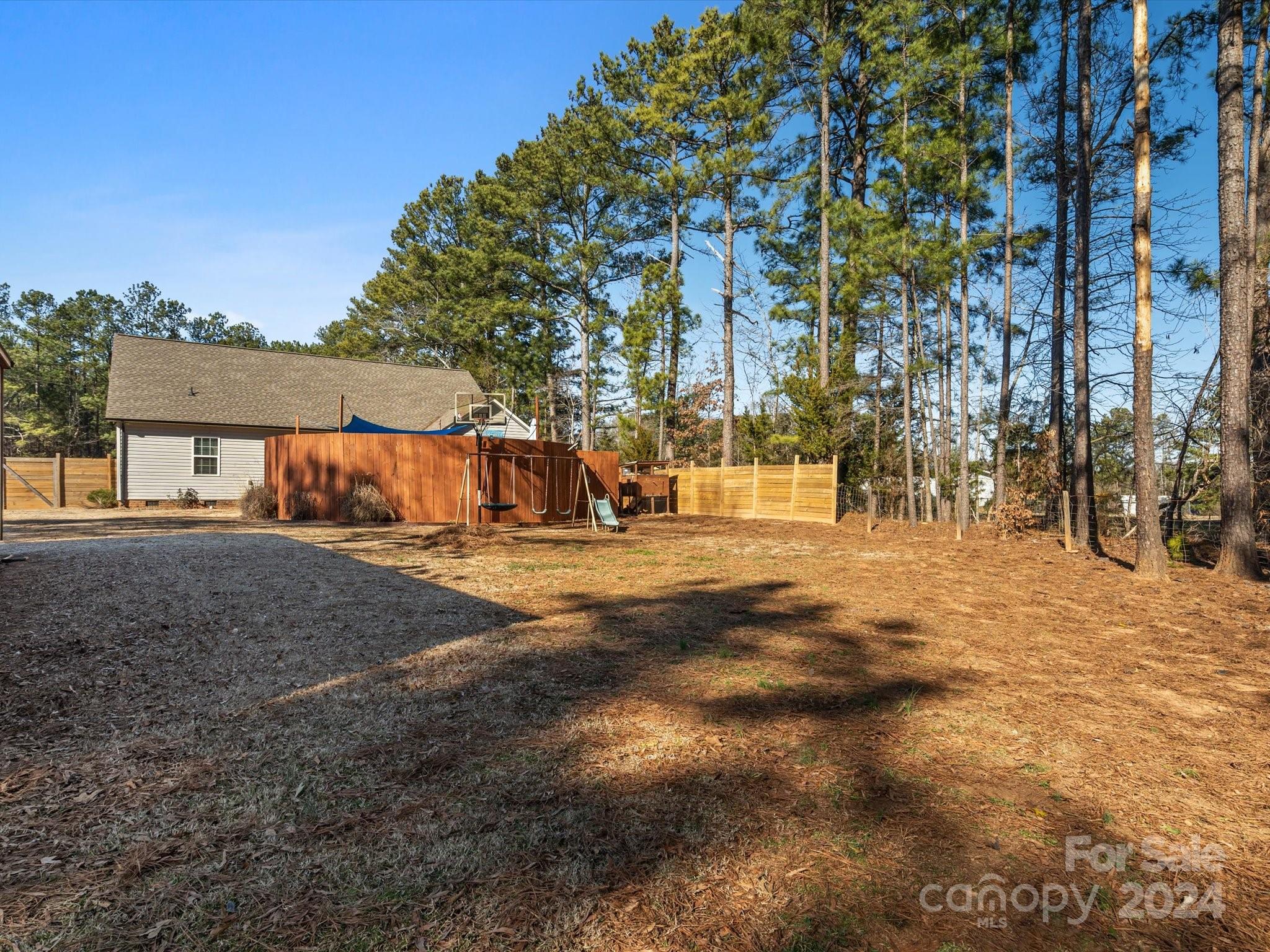 1128 State Rd S-46-817 York, SC 29745 - Photo 21 of 22 a view of road with large trees