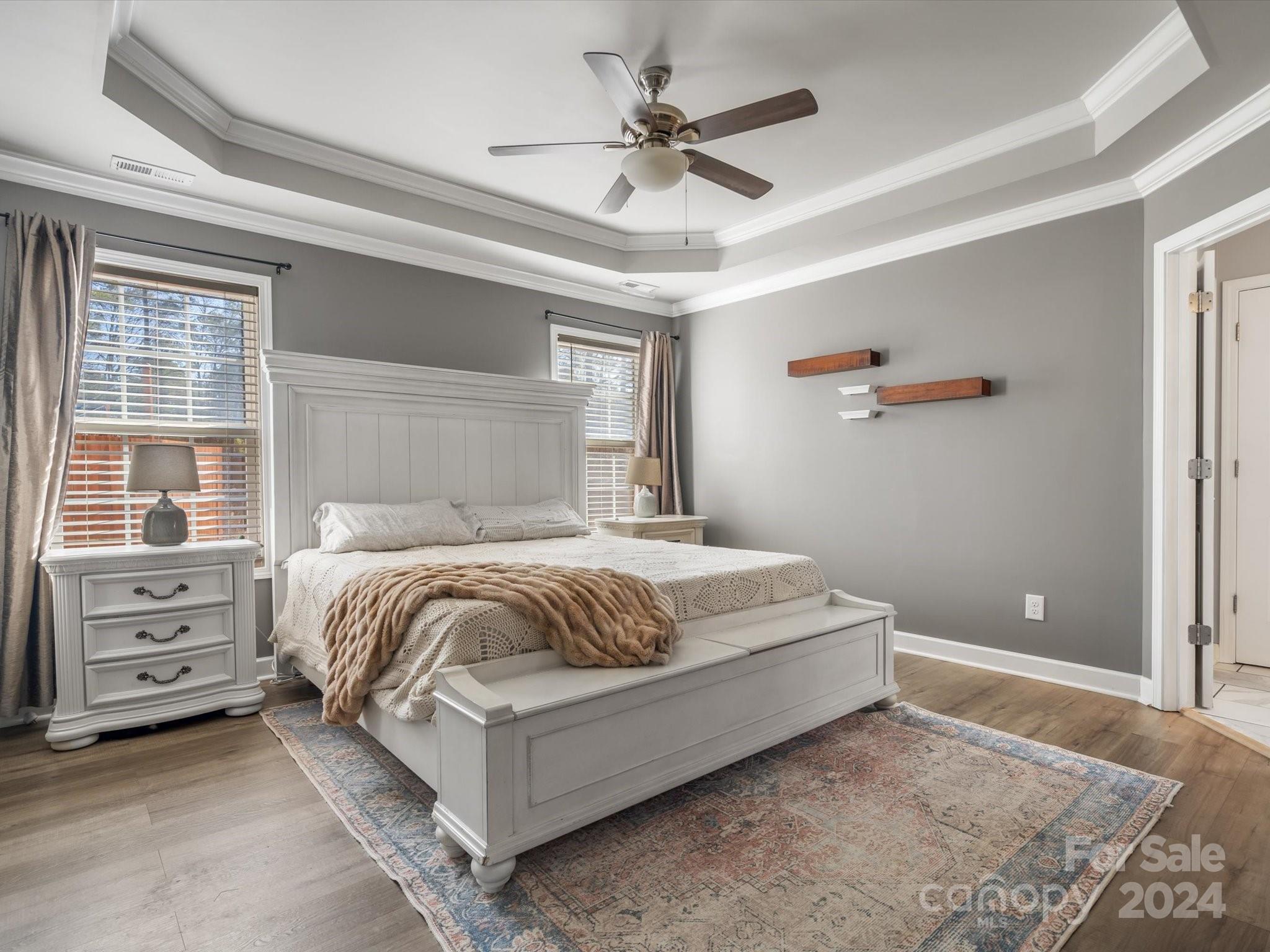 1128 State Rd S-46-817 York, SC 29745 - Photo 10 of 22 a spacious bedroom with a bed and a ceiling fan