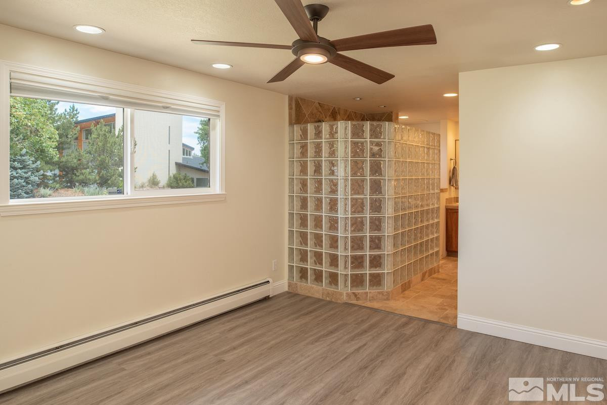 3900 Warren Way Reno, NV 89509 - Photo 16 of 29 a view of a livingroom with wooden floor and a window
