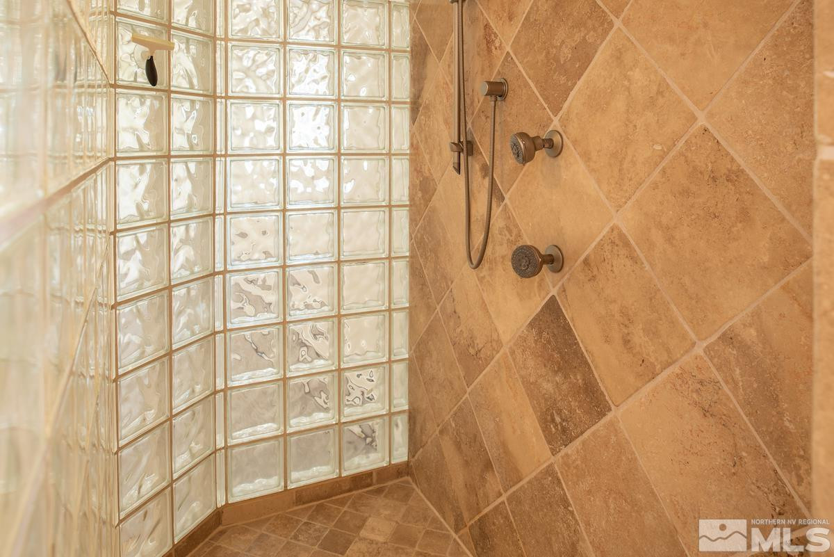 3900 Warren Way Reno, NV 89509 - Photo 20 of 29 a bathroom with a shower