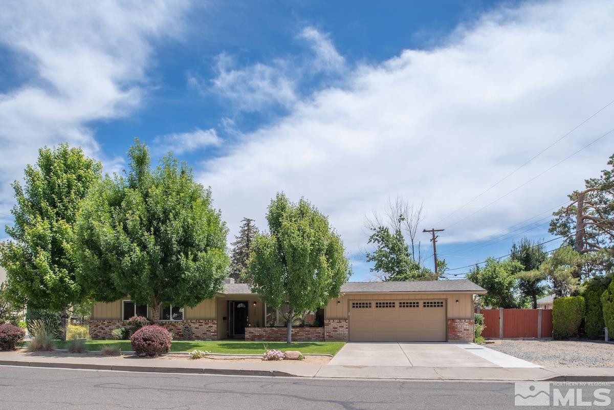 3900 Warren Way Reno, NV 89509 - Photo 2 of 29 a view of a house with a garden