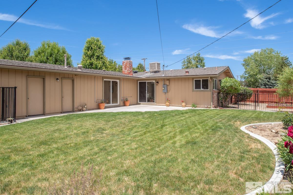 3900 Warren Way Reno, NV 89509 - Photo 26 of 29 a front view of house with yard and green space