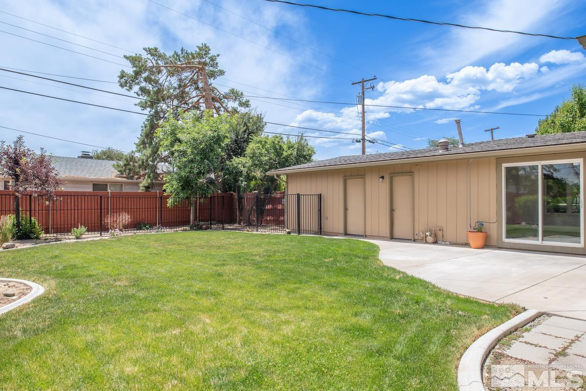 3900 Warren Way Reno, NV 89509 - Photo 28 of 29 a front view of a house with garden