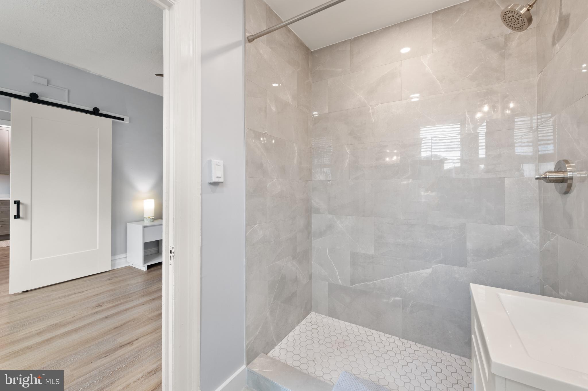 2456 20th Street Northwest, Unit 507 Washington, DC 20009 - Photo 34 of 42 a bathroom with a shower and a toilet