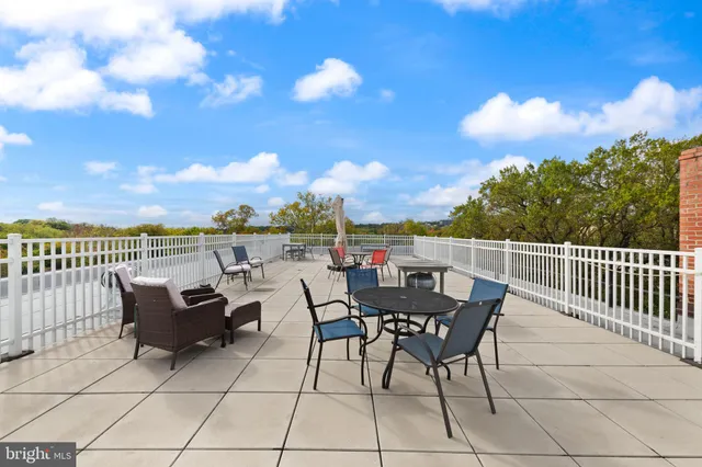 a view of a terrace with sitting area