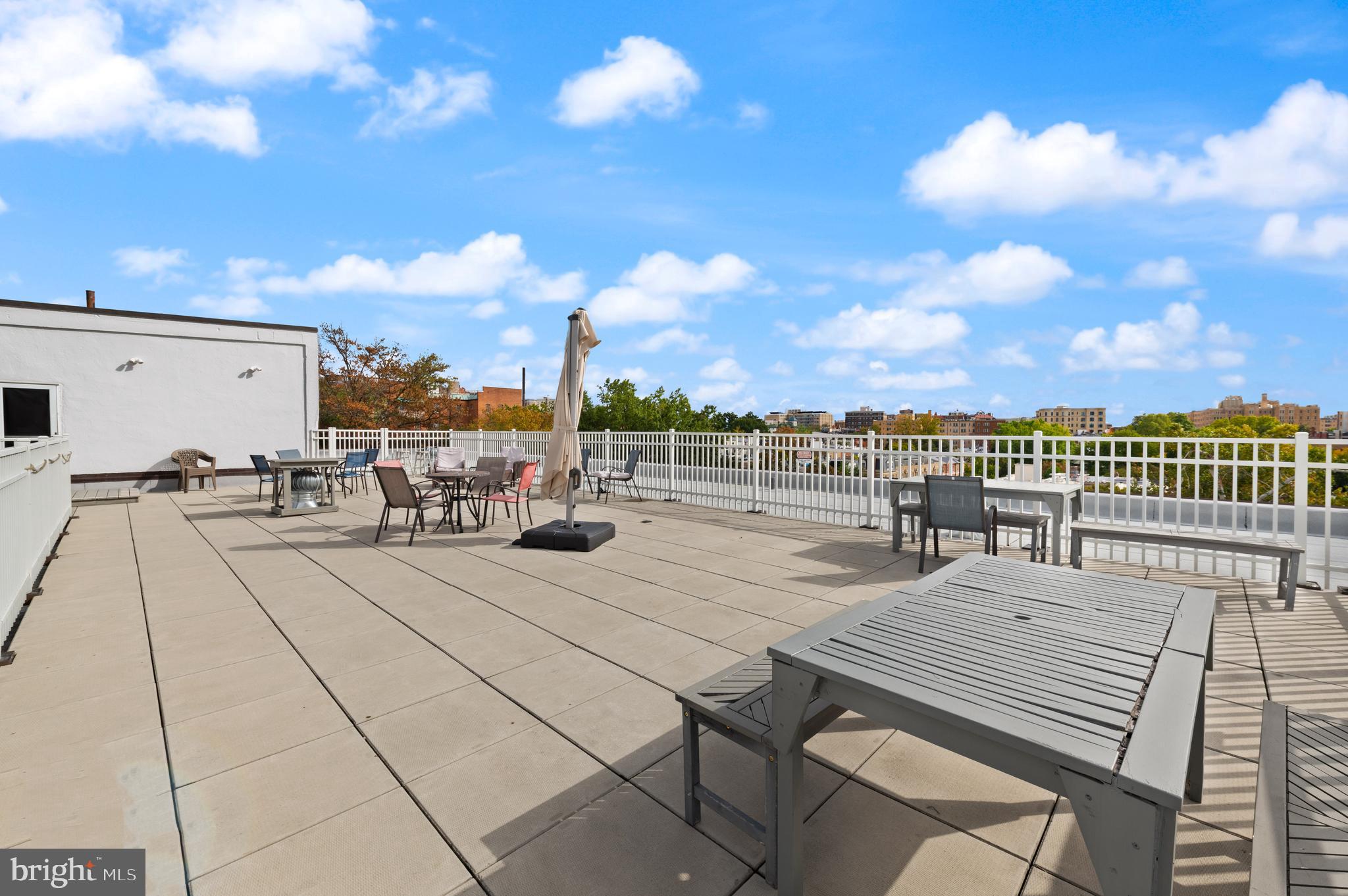 2456 20th Street Northwest, Unit 507 Washington, DC 20009 - Photo 40 of 42 a view of a terrace with sitting area
