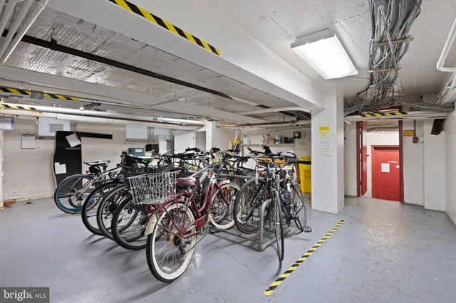 a kitchen with cabinets and white appliances
