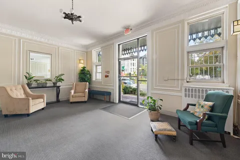 an empty room with closet and wooden floor