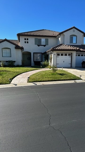 811 Inverlochy Drive Fallbrook, CA 92028 - Photo 2 of 31 a front view of a house with a yard