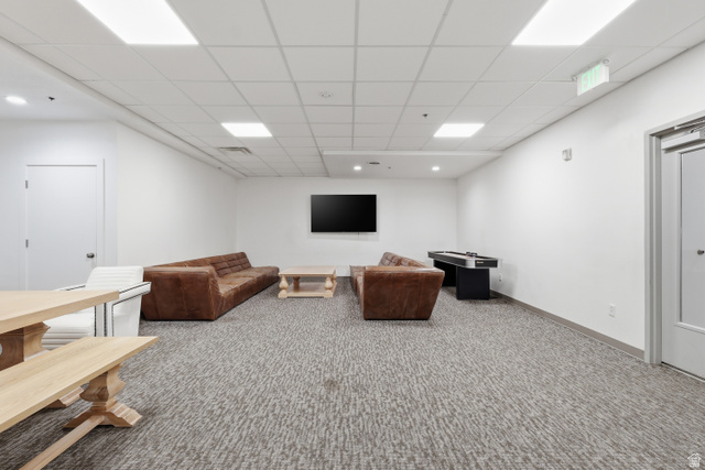 2085 North Main Street, Unit 409 Sunset, UT 84015 - Photo 9 of 17 Club room with carpet and a paneled ceiling