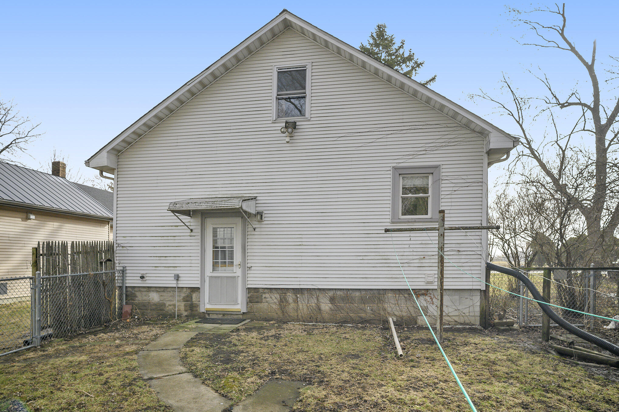 1013 Merrillville Road Crown Point, IN 46307 - Photo 15 of 16 a front view of a house with garden