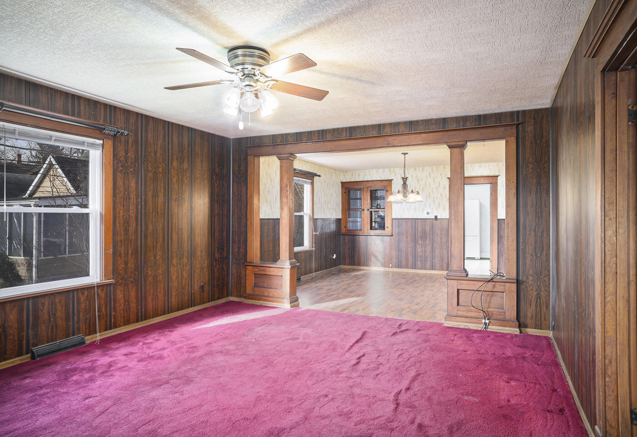 1013 Merrillville Road Crown Point, IN 46307 - Photo 4 of 16 an empty room with fan and windows