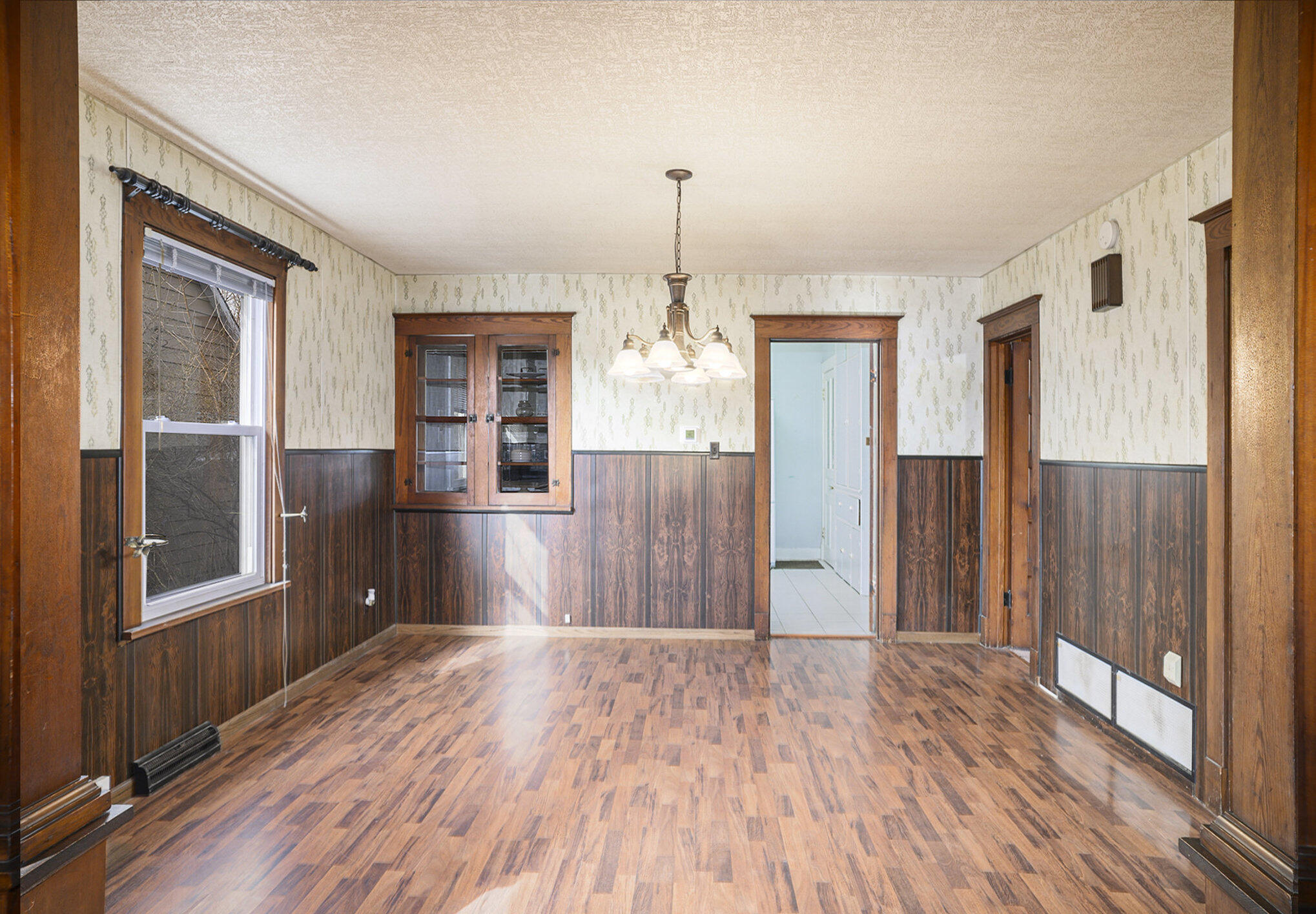 1013 Merrillville Road Crown Point, IN 46307 - Photo 6 of 16 a view of a room with wooden floor entryway and windows