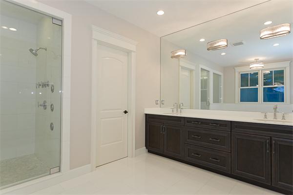 56 Broken Tree Road Newton, MA 02459 - Photo 19 of 30 a bathroom with a granite countertop sink mirror and double