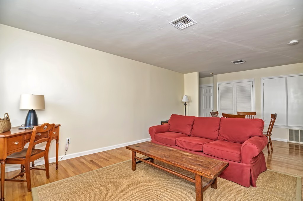 15 Church Street, Unit 2 Natick, MA 01760 - Photo 6 of 14 a blue room with a couch