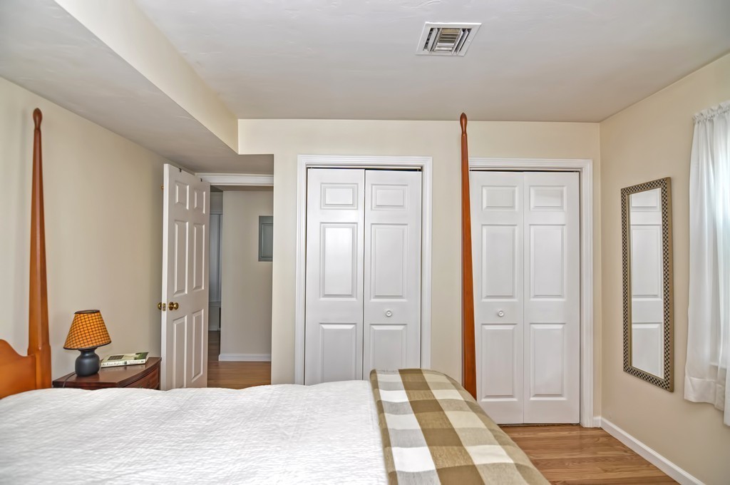 15 Church Street, Unit 2 Natick, MA 01760 - Photo 8 of 14 a bedroom with a bed and a dresser