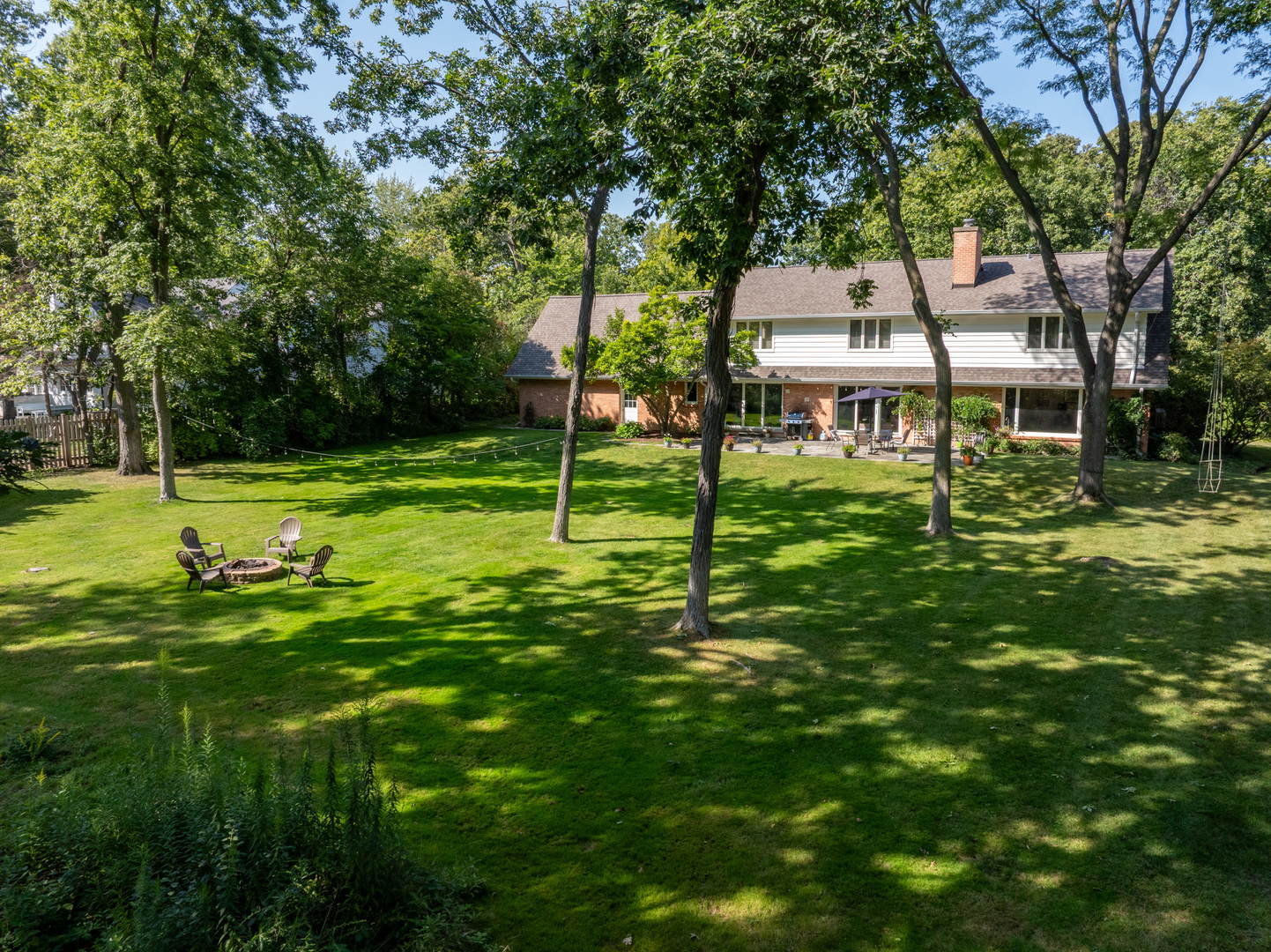 7 Old Hunt Road Northfield, IL 60093 - Photo 4 of 5 a view of a house with a big yard