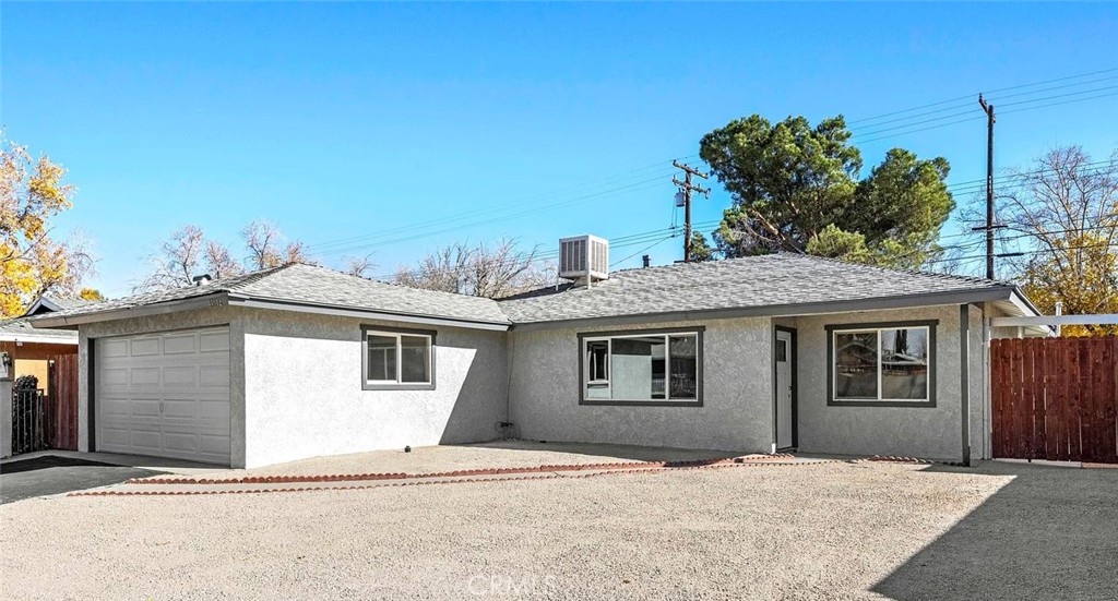 44532 Andale Avenue Lancaster, CA 93535 - Photo 17 of 21 a house with a outdoor space
