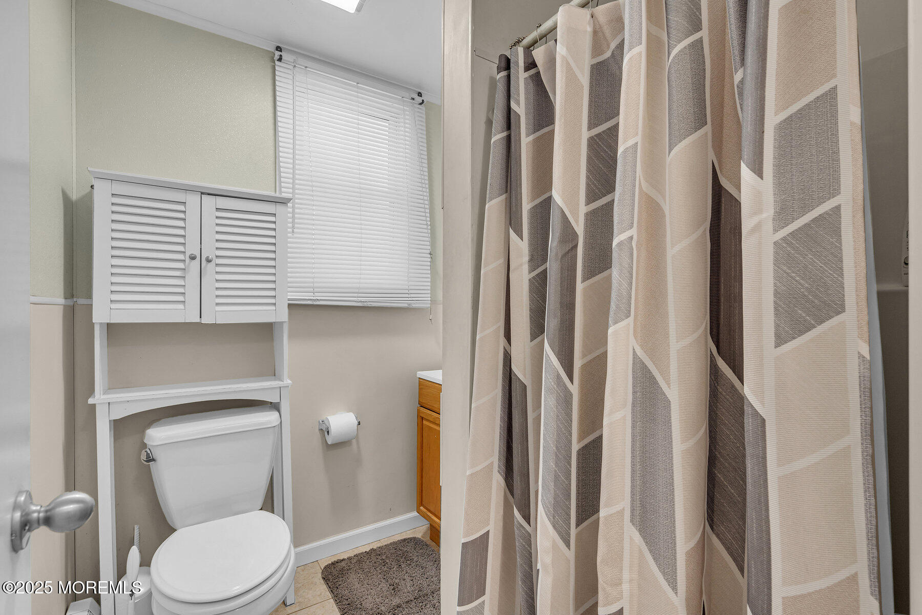 549 Brielle Road Manasquan, NJ 08736 - Photo 11 of 17 a white toilet sitting next to a bathroom sink