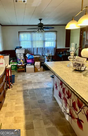 a room with furniture and window