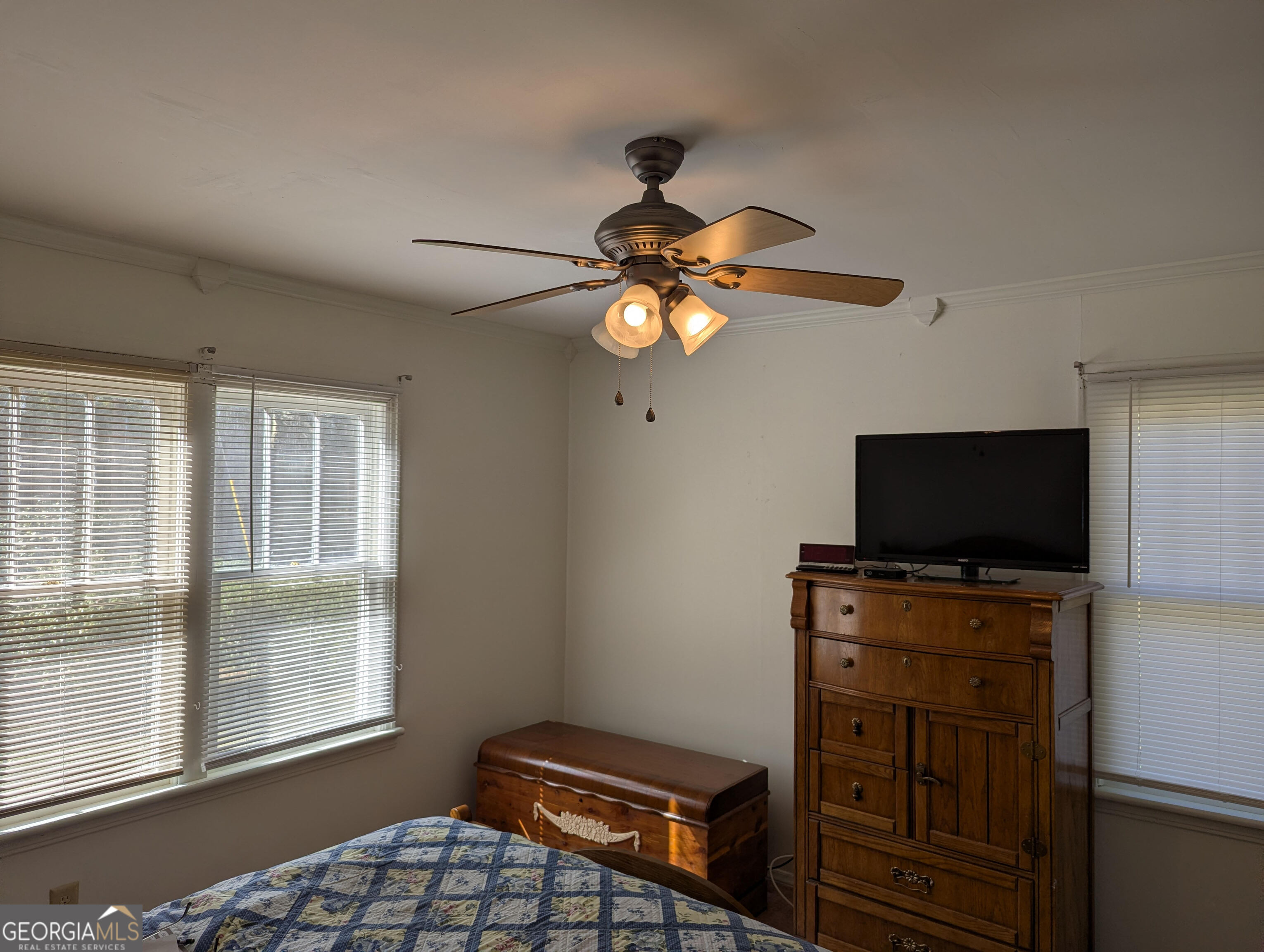 404 Community Drive Waycross, GA 31501 - Photo 24 of 24 a living room with furniture and flat screen tv