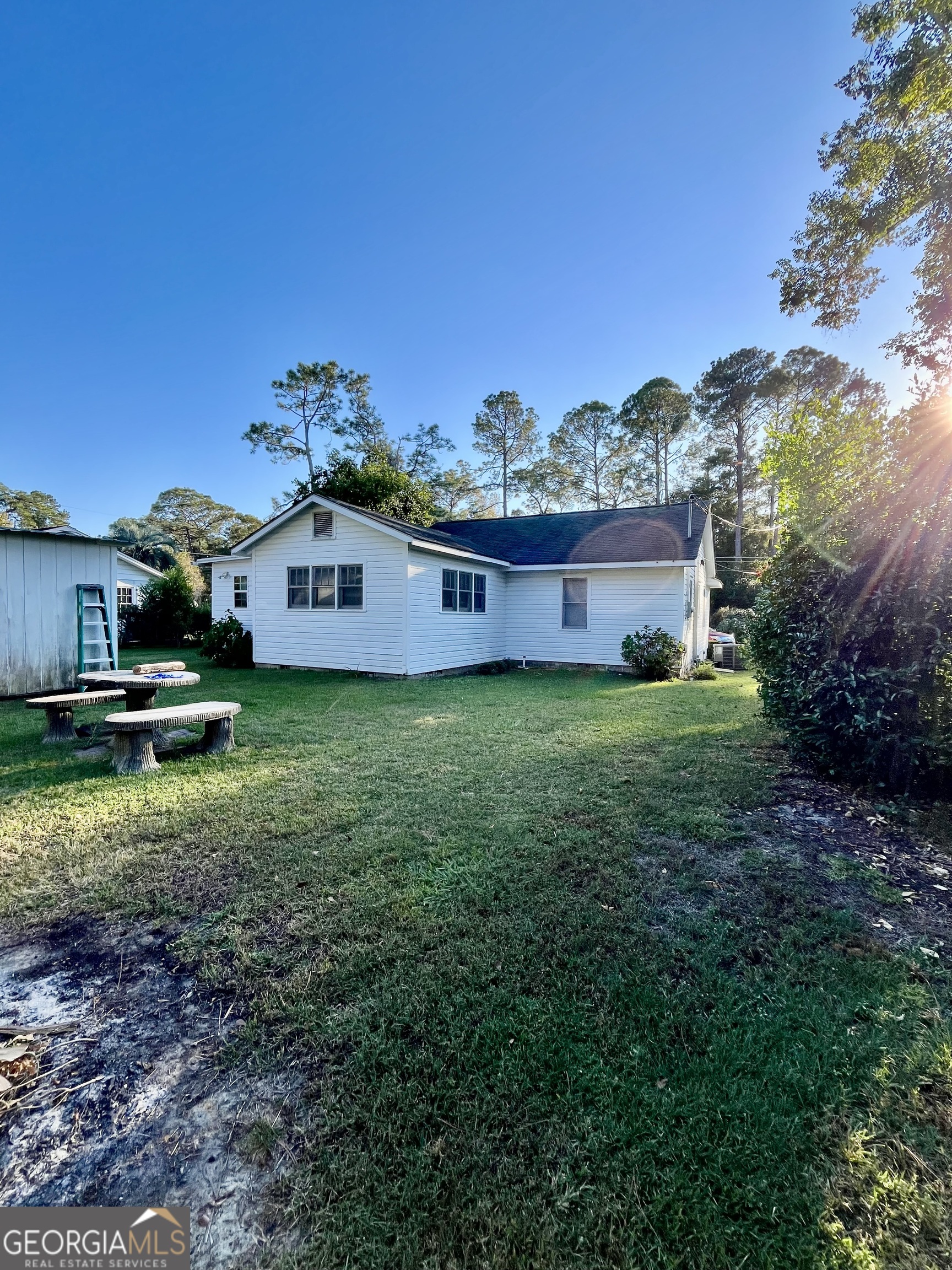 404 Community Drive Waycross, GA 31501 - Photo 3 of 24 a view of a house with a yard