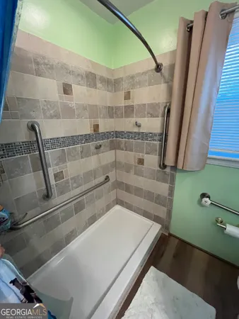 a bathroom with a bathtub