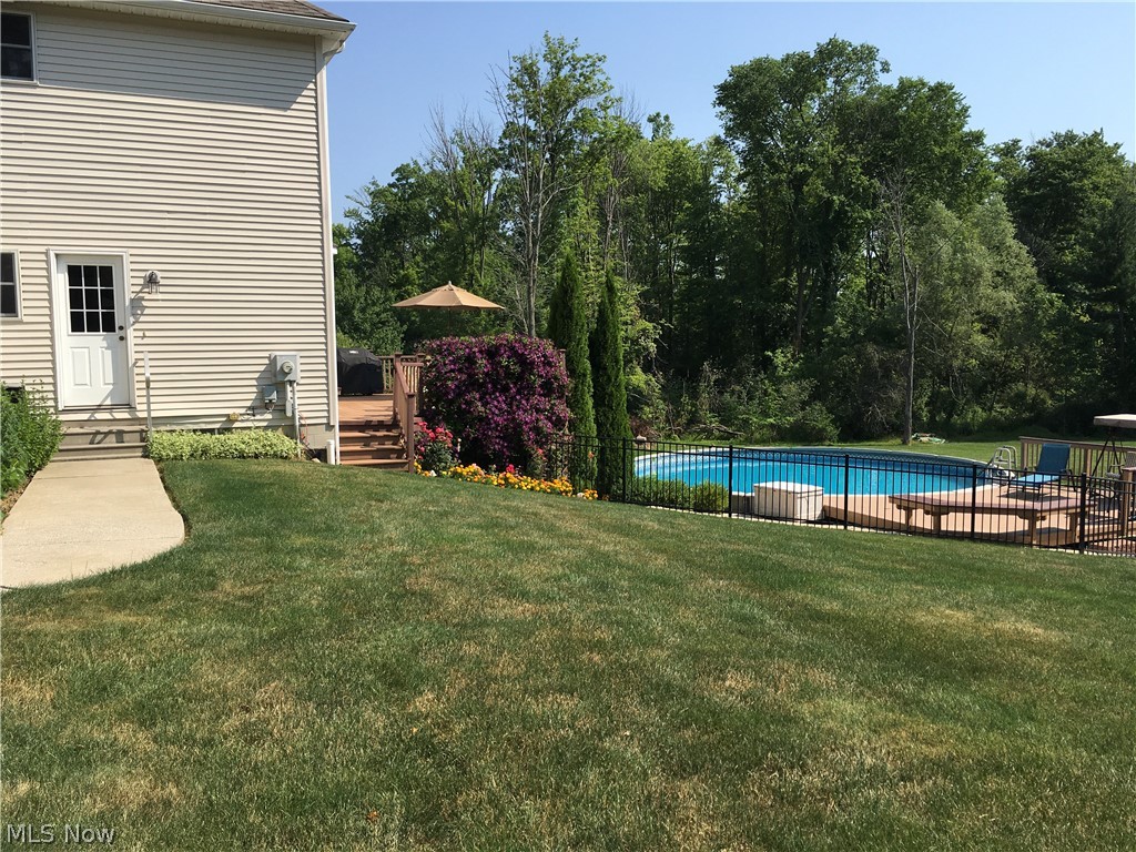 12395 Falcon Ridge Road Chesterland, OH 44026 - Photo 33 of 35 This Home Has So Much to Offer and Offers Lush Landscaping, an Above Ground Pool,
Fenced In, Two Decks and Lots of Green Space!