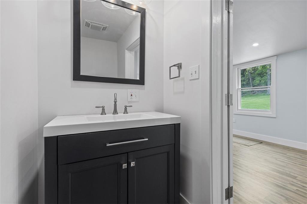 234 Navajo Road Pittsburgh, PA 15241 - Photo 17 of 34 Powder room conveniently located off of the family room.