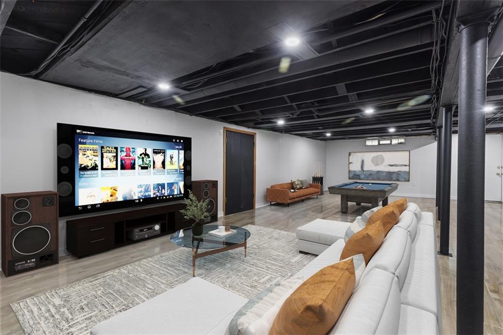 234 Navajo Road Pittsburgh, PA 15241 - Photo 28 of 34 Digitally staged, the game room is huge with plenty of room for multiple living spaces.