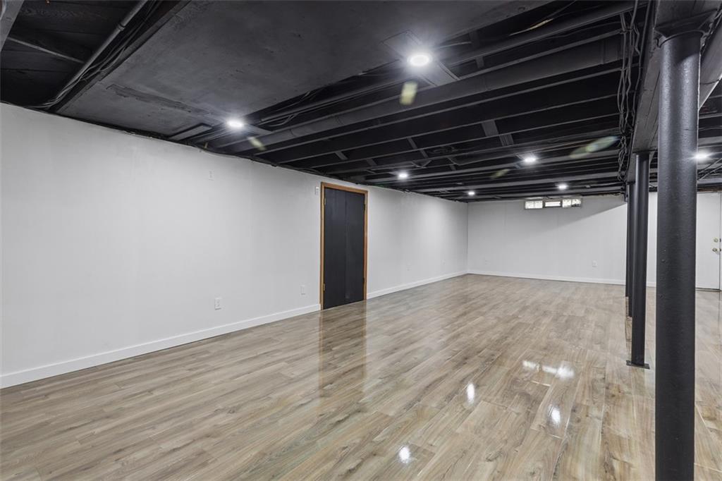 234 Navajo Road Pittsburgh, PA 15241 - Photo 29 of 34 The game room is huge with plenty of room for multiple living spaces.